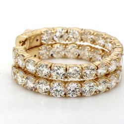 1' Inside out hoop earrings in yellow gold with prong set round diamonds.  D8.12ct.t.w.