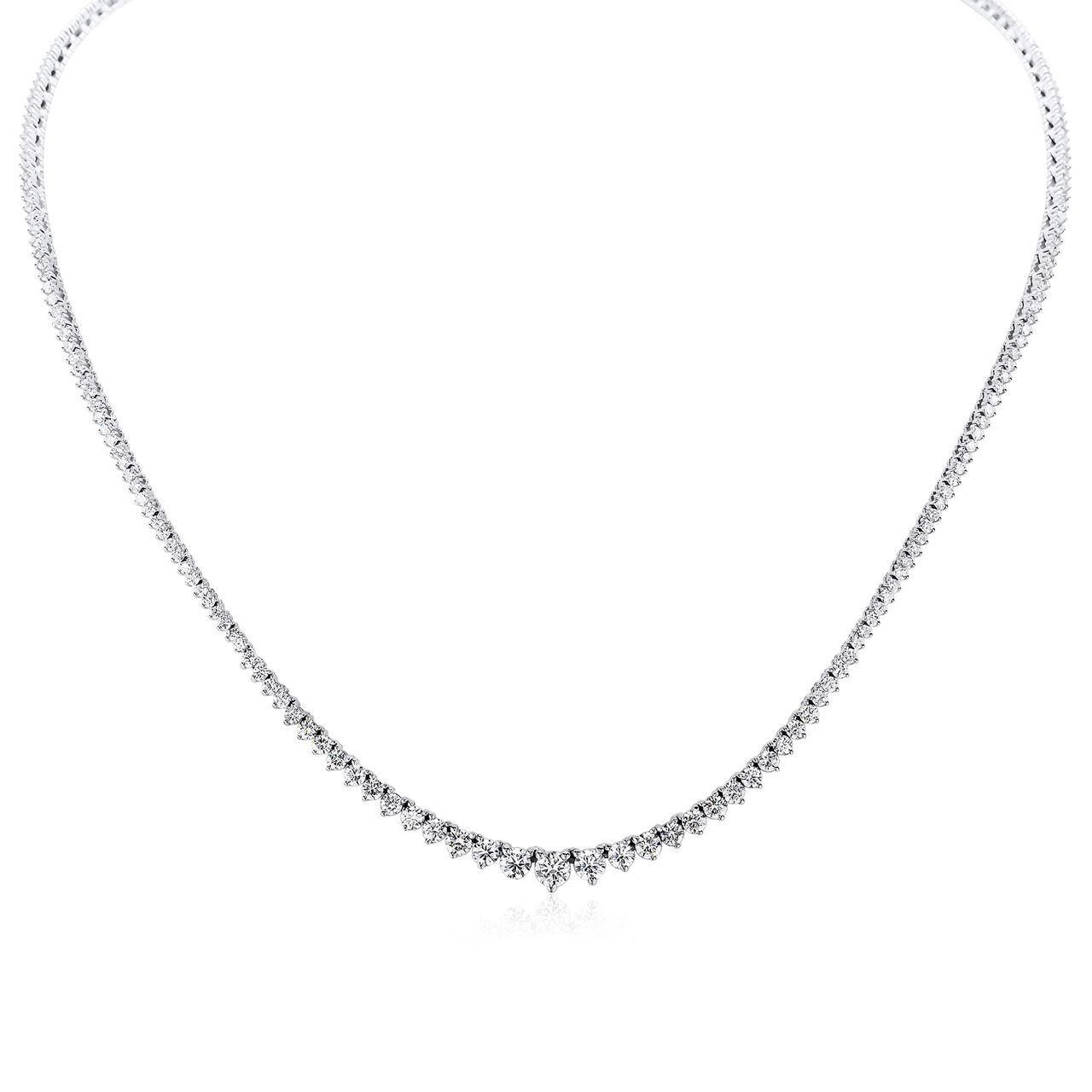 18' Graduating half-way tennis necklace in 18K WG with 3-prong basket set (193) round diamonds.  D5.14ct.t.w.