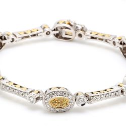 Bracelet in 18K two-tone with round white & yellow diamonds.  D2.33ct.t.w.