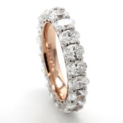 Eternity band in platinum with 18K RG comfort-fit interior with shared U-prong set (20) oval diamonds.  D3.75ct.t.w.  Size 5.5