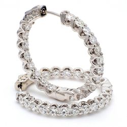 1.25' Inside out hoop earrings with U-prong set round diamonds.  D5.09ct.t.w.