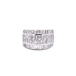 Wide band with invisible set combination princess cuts and baguettes on the center & channel set baguette diamonds on the sides.  D2.87ct.t.w.