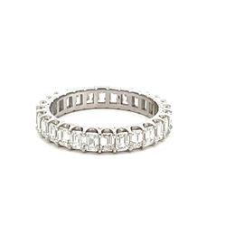 Eternity band in platinum with prong set (28) emerald cut diamonds.  D3.00ct.t.w.