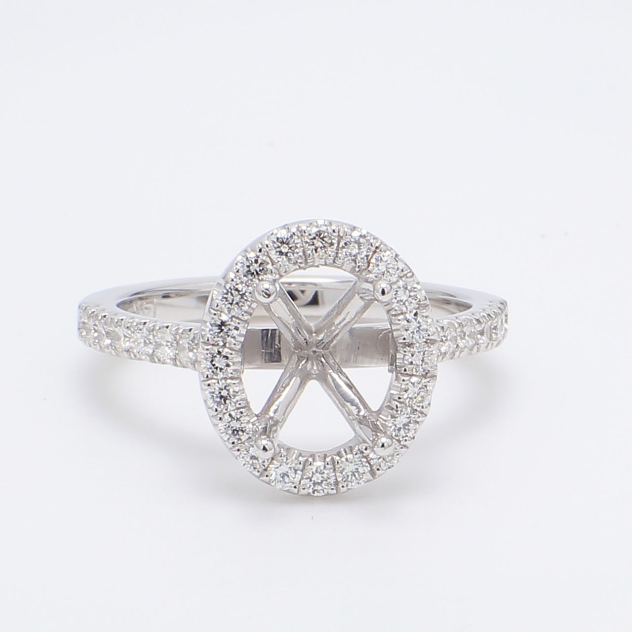 Halo semi-mount with U-prong set round diamonds.  D0.56ct.t.w.  Size 6