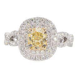 Double halo criss cross shank ring in 18K WG with rounds around a FY cushion cut diamond center stone.  D1.68ct.t.w.  (Center 1.08ct.)  Size 6.75
