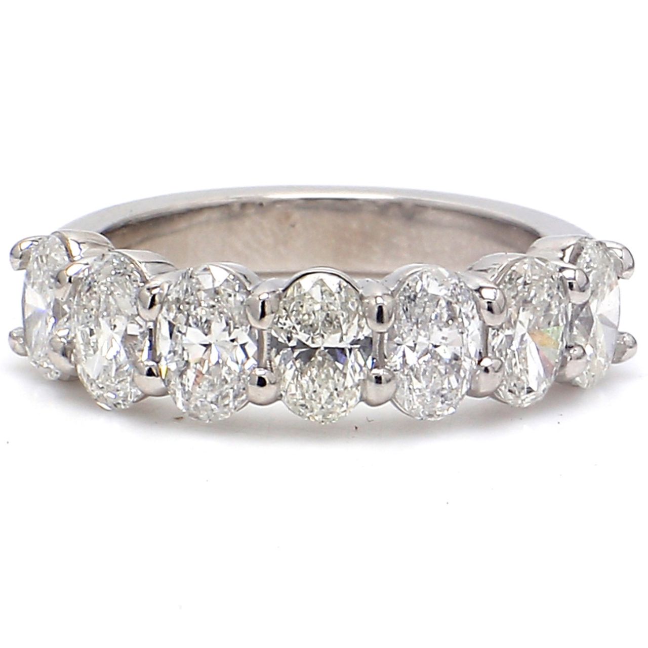 7-stone band in platinum with basket prong set oval cut diamonds.  D1.85ct.t.w.  Size 5.5