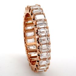 Eternity band in 18K RG with U-prong set (25) emerald cut diamonds.  D4.46ct.t.w.  Size 7.5