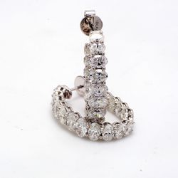 0.75' Inside out hoop earrings in 18K WG with basket prong set (32) oval diamonds.  D5.85ct.t.w.