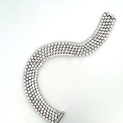7' 5-row bracelet in 18K WG with soft links, 2 and 3-prong set round diamonds.  D19.47ct.t.w.