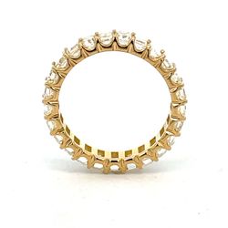 Eternity band in 18K YG with prong set (25) emerald cut diamonds.  D3.12ct.t.w.  Size 6