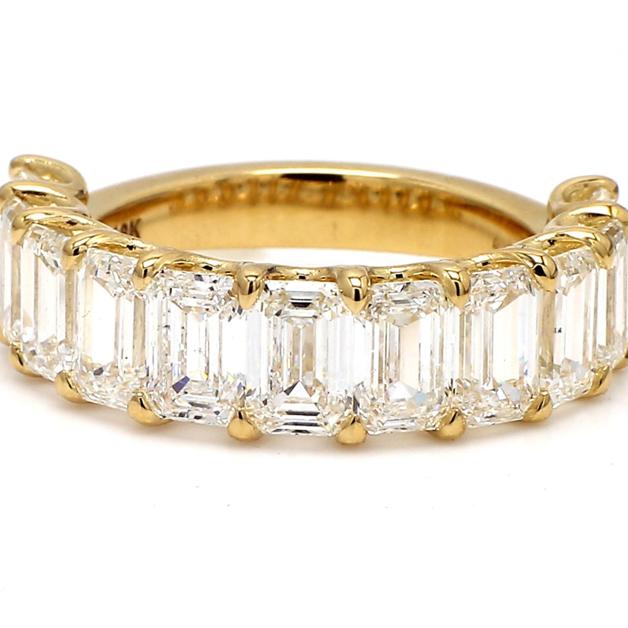 11-stone band in 18K YG with U-prong set GIA certified E-G/VVS2-VS2 emerald cut diamonds.  D7.83ct.t.w.  Size 9