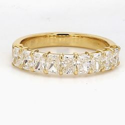9-stone band in 18K YG with basket prong set radiant cut diamonds.  D1.31ct.t.w.  Size 5.5