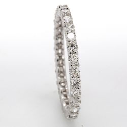 Eternity band in 18K WG with U-prong set (28) round diamonds.  D0.83ct.t.w.  Size 5