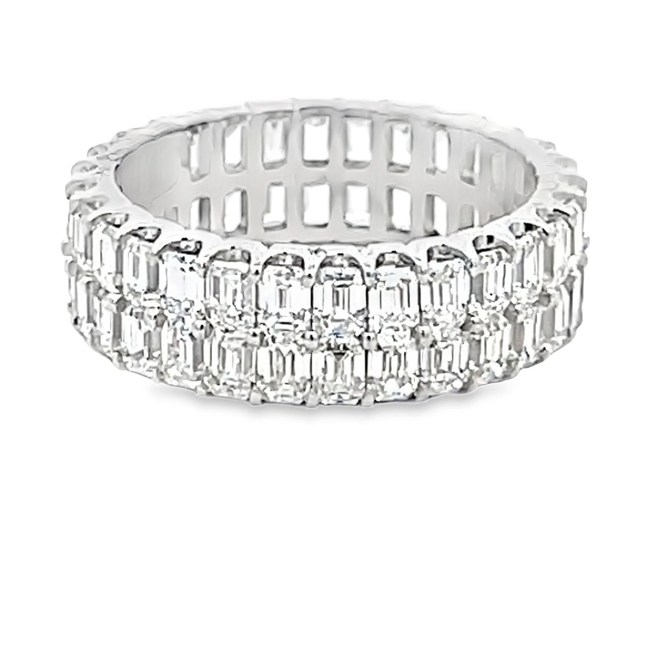 Two-row eternity band in platinum with U-prong set (60) emerald cut diamonds.  D4.88ct.t.w.  Size 6.5