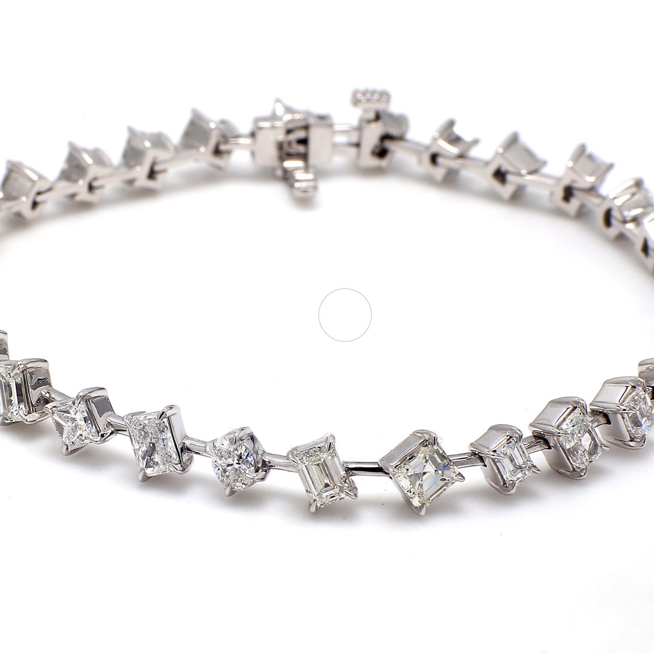 7' Bracelet in platinum with claw prong set mixed fancy shaped diamonds.  D6.56ct.t.w.