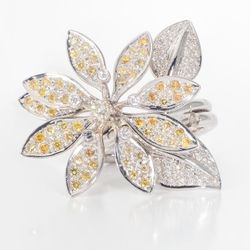 Folded style flower ring with bezel and pave set round diamonds.  D1.56ct.t.w.