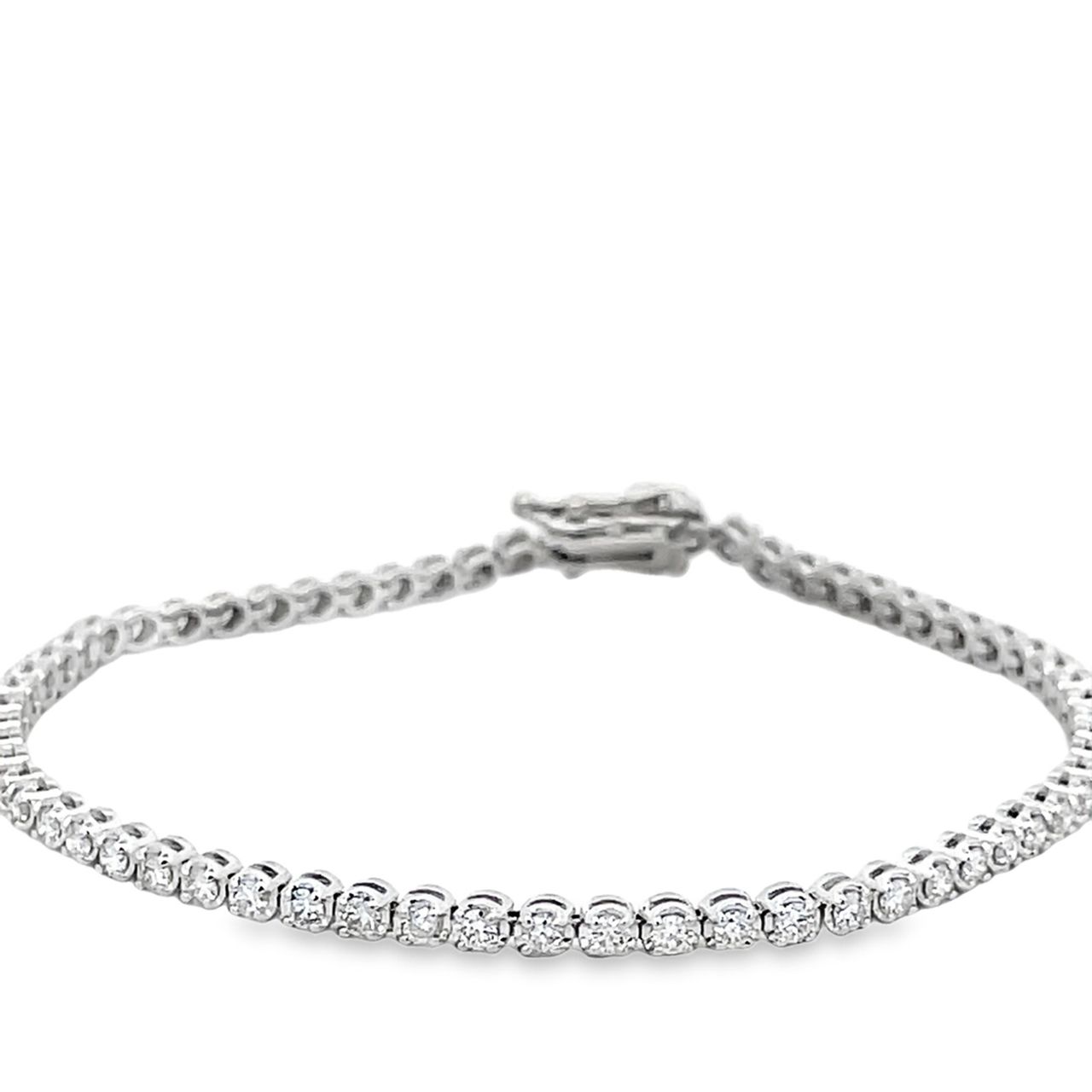 7' Tennis bracelet with illusion set (64) round diamonds.  D1.64ct.t.w.