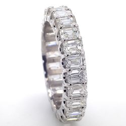 Eternity band in platinum wih U-prong set (24) emerald cut diamonds.  D3.50ct.t.w.  Size 5.75