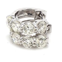 0.50' Huggy earrings with shared prong set (8) round diamonds.  D2.34ct.t.w.