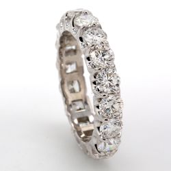 Eternity band in platinum with U-prong set (18) round diamonds.  D3.15ct.t.w.  Size 6