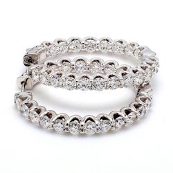 0.50' Inside out hoop earrings with U-prong set (32) round diamonds & with special spring lock.  D0.65ct.t.w.