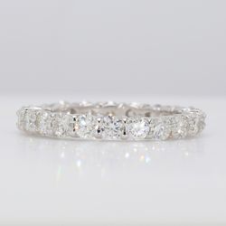 Eternity band with shared prong set round diamonds.  D1.68ct.t.w.  Size 5.5