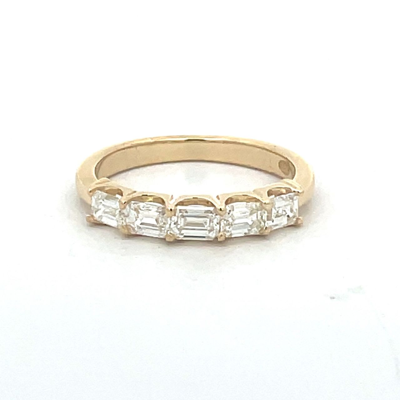 5-stone band east west style in 18K YG with prong set emerald cut diamonds.  D0.96ct.t.w.  Size 6.5