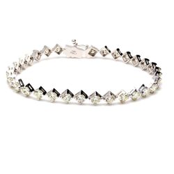 6.75' Tennis bracelet with side ways prong set (32) round diamonds.  D5.99ct.t.w.