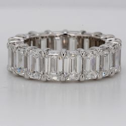 Eternity band in platinum with basket claw set GIA certified D-E/IF-VS (18) emerald cut diamonds.  D9.02ct.t.w.  Size 6