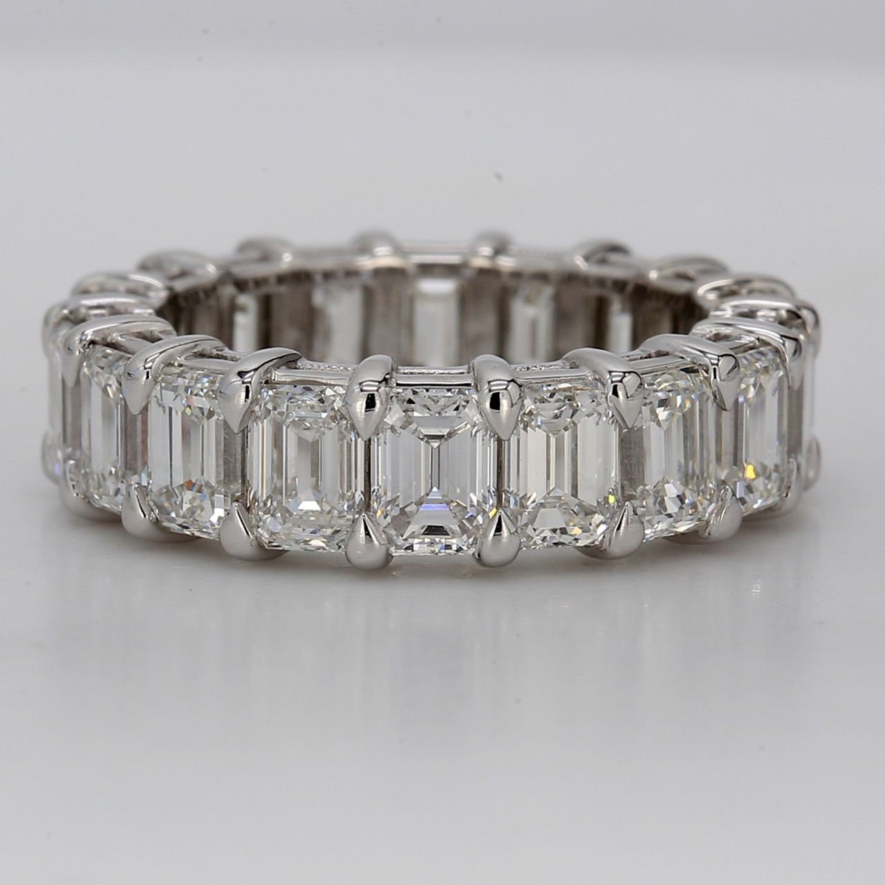 Eternity band in platinum with shared prong basket set GIA certified D-F/VVS1-VS2 (18) emerald cut diamonds.  D8.46ct.t.w.  Size 6.75