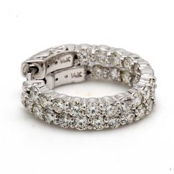 0.75' Inside out hoop earrings with prong set (30) round diamonds & with special spring lock.  D1.83ct.t.w.
