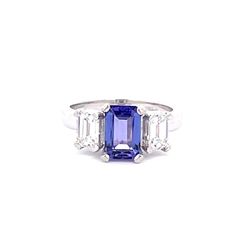 3-stone ring in platinum with prong set emerald cut diamonds and tanzanite center.  D1.00ct.t.w.  (Tanzanite - 1.70ct.)