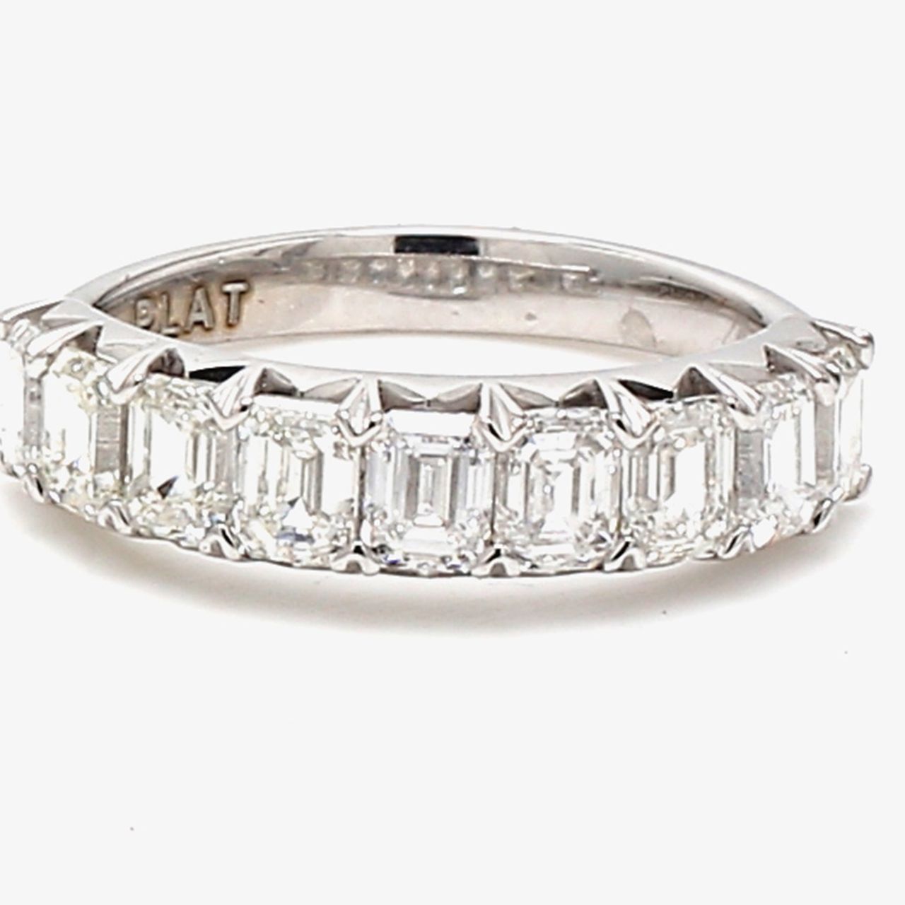 9-stone band in platinum with prong set emerald cut diamonds.  D2.28ct.t.w.  Size 6.75