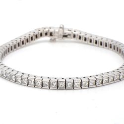 7' Tennis bracelet with channel set princess cut diamonds.  D6.59ct.t.w.