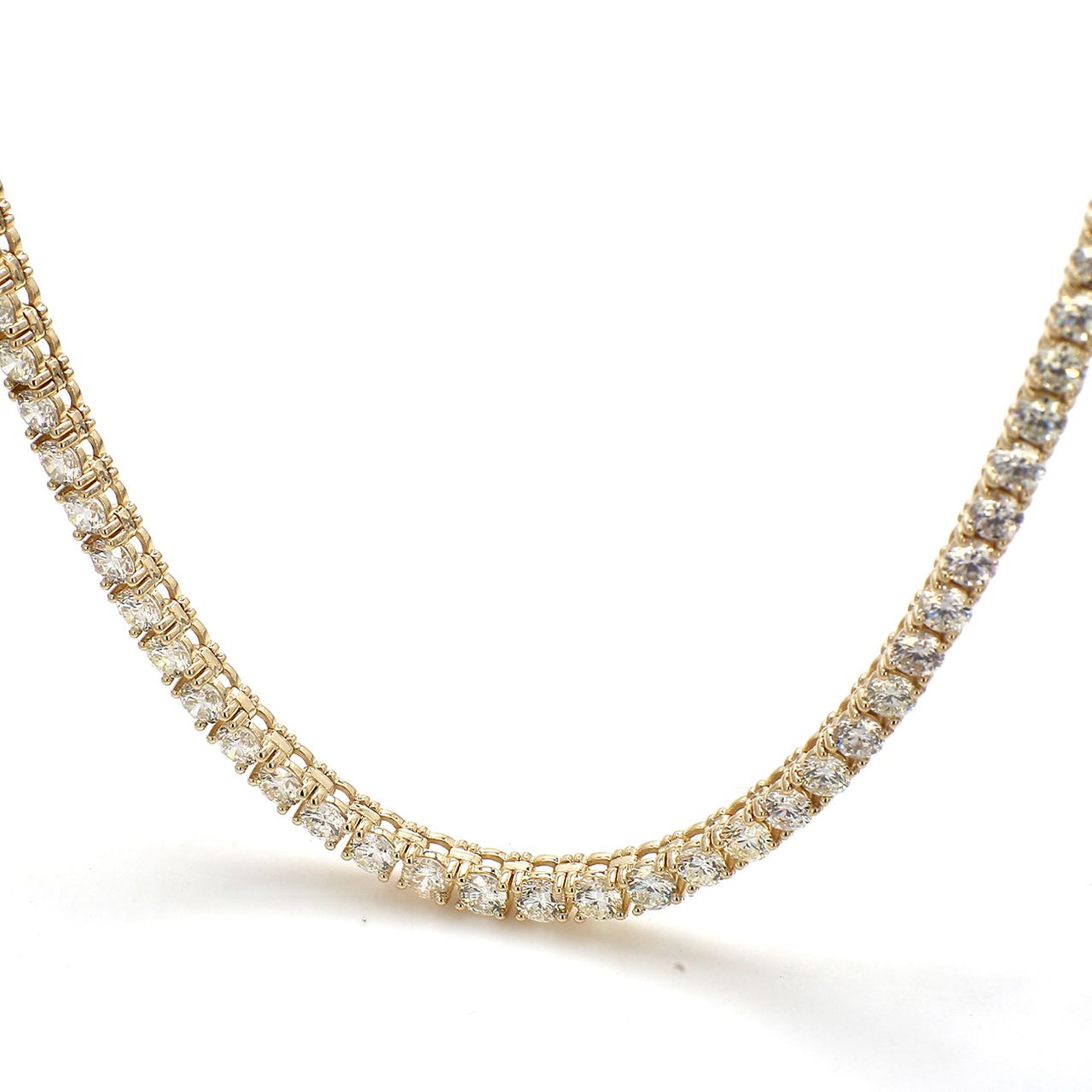 22' Tennis necklace in 14K YG with 4-prong set (182) round diamonds.  D14.57ct.t.w.