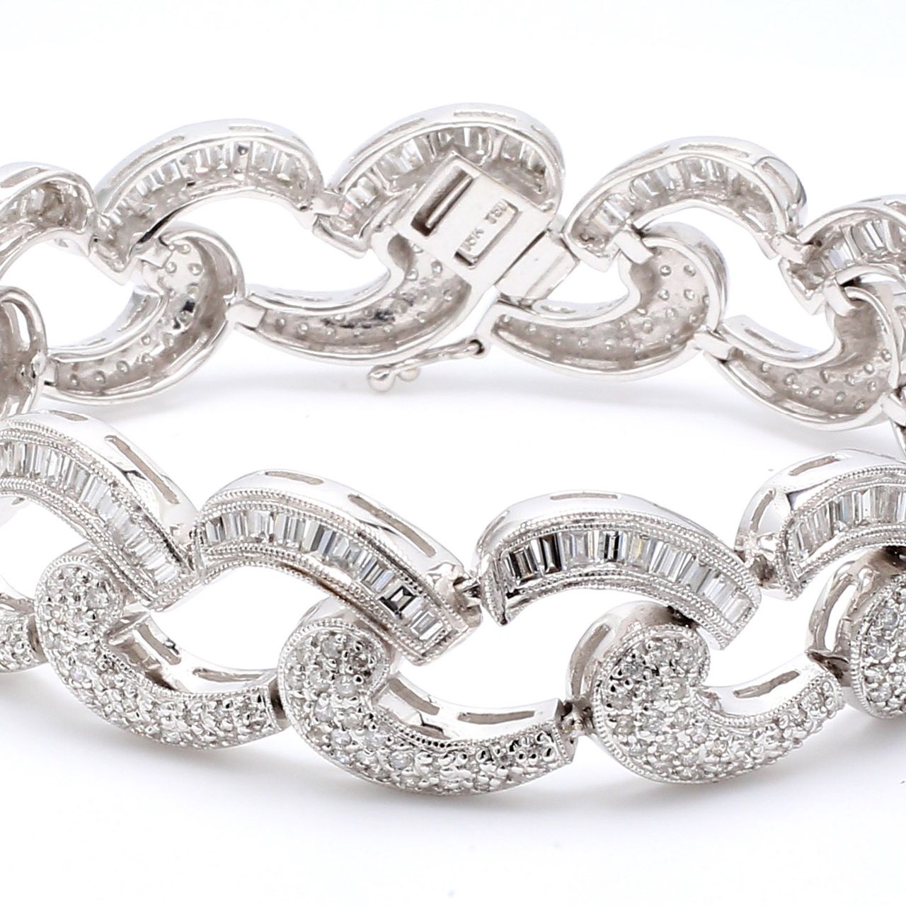 7' Antique style bracelet in 18K WG with baguette & round diamonds.  D4.50ct.t.w.