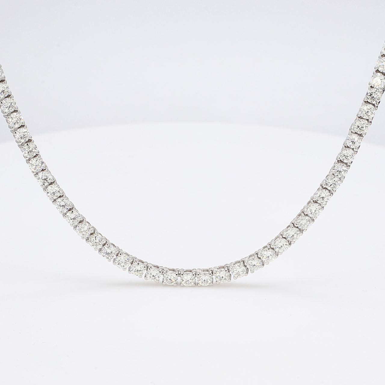 20' Tennis necklace with prong set round diamonds.  D13.70ct.t.w.