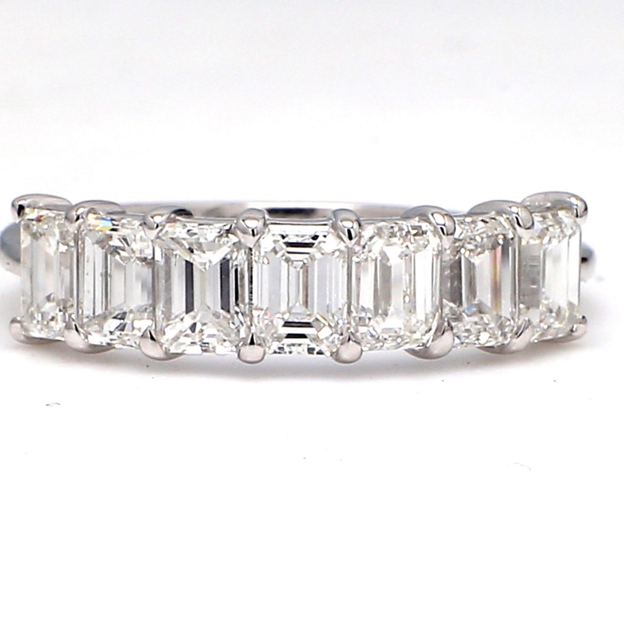 7-stone band in platinum with prong set emerald cut diamonds.  D1.82ct.t.w.  Size 6.75