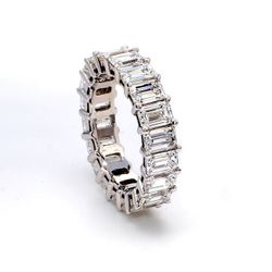 Eternity band with shared prong set emerald cut diamonds.  D6.20ct.t.w.  Size 6