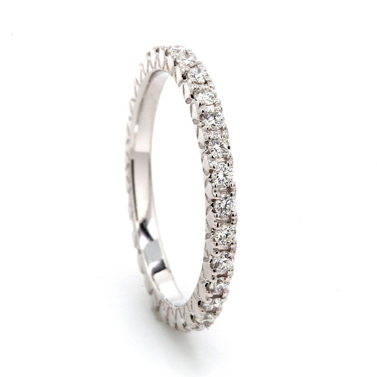 Eternity band with pre-set 4-(30) round diamonds.  D0.51ct.t.w.  Size 6.25