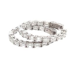 1' Inside out hoop earrings with basket prong set (30) emerald cut diamonds.  D2.78ct.t.w.