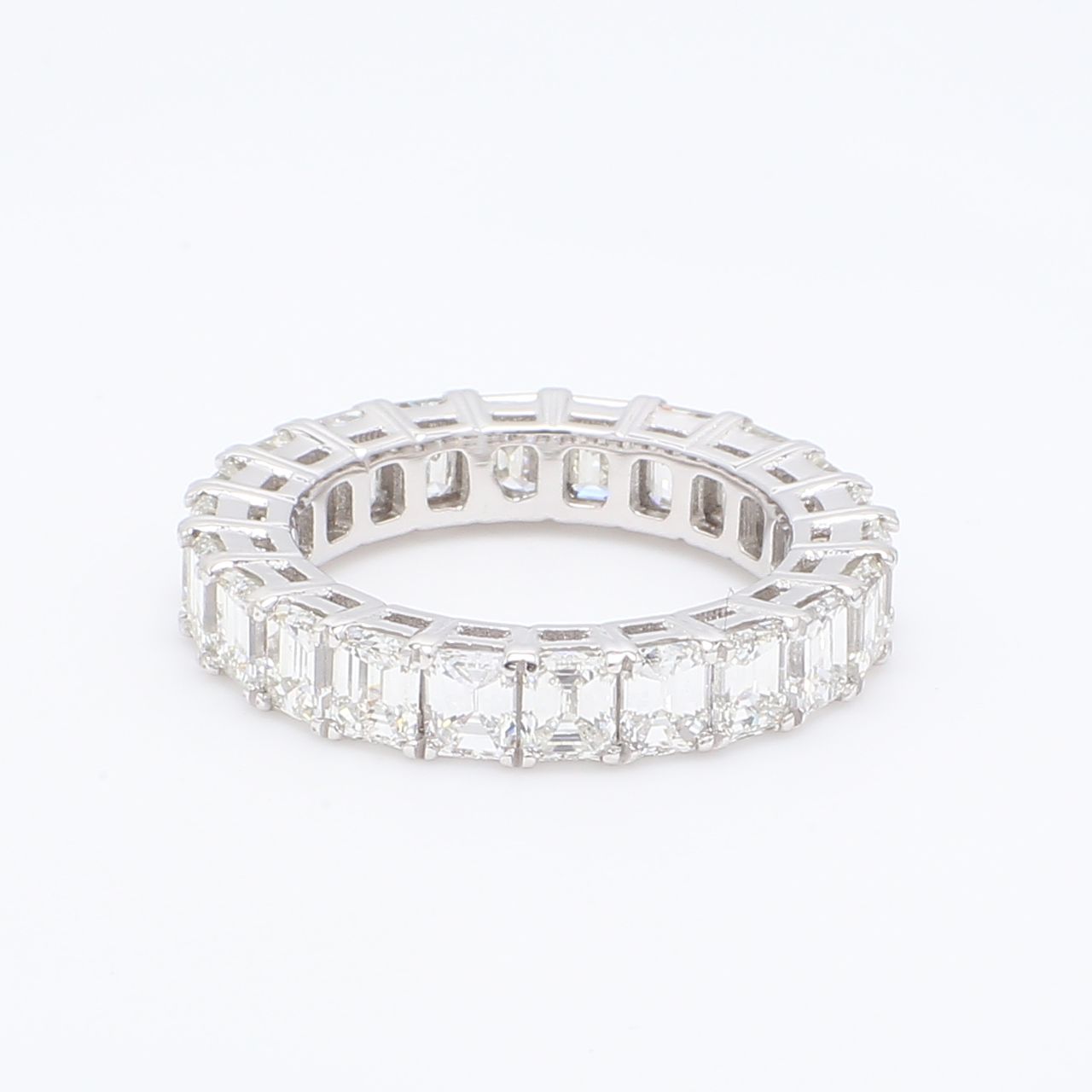 Eternity band in platinum with double basket prong set emerald cut diamonds.  D4.51ct.t.w.