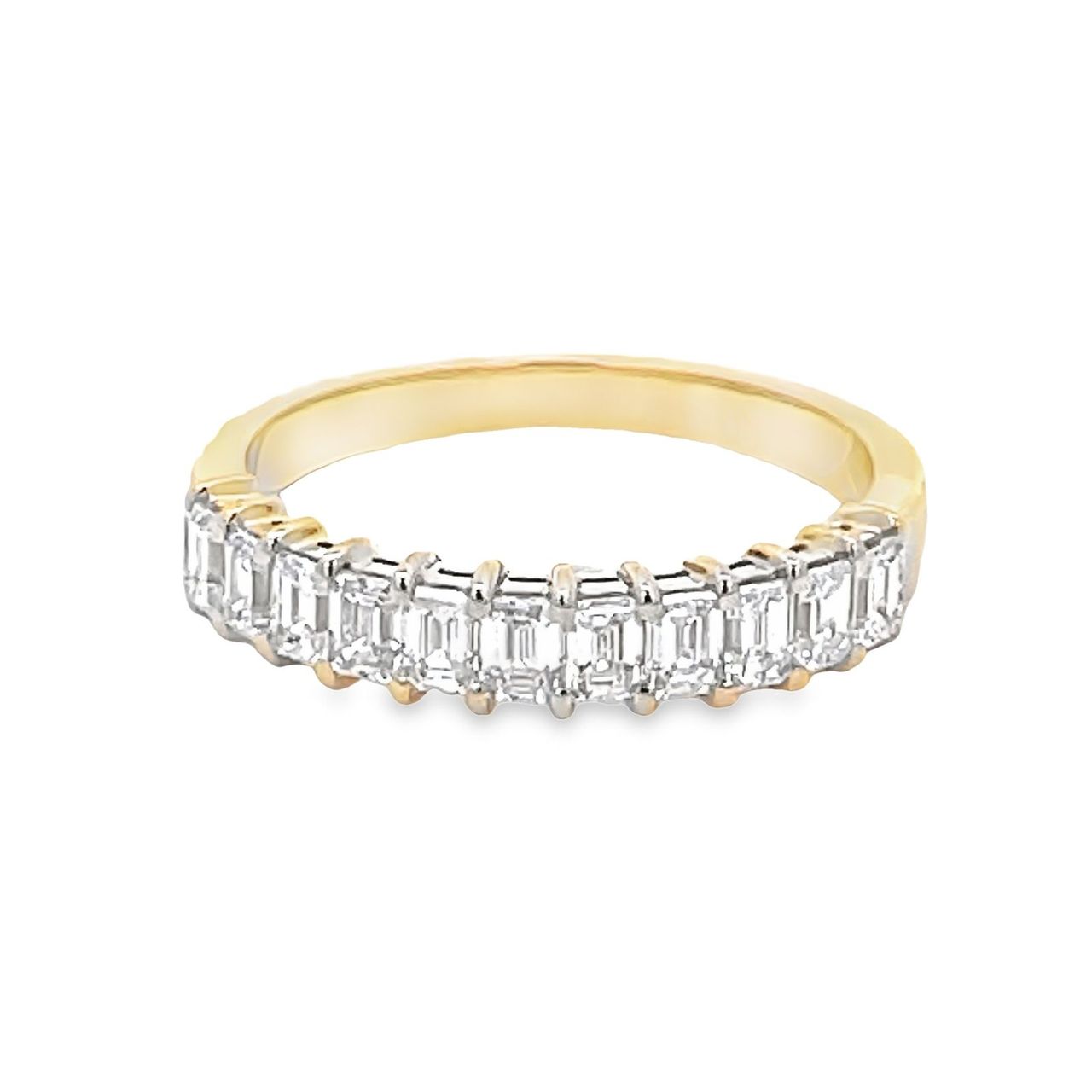 Single row band in 14K YG with basket prong set (11) emerald cut diamonds.  D0.98ct.t.w.  Size 6.25