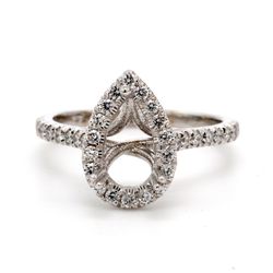 Halo semi-mount with U-prong set round diamonds.  D0.41ct.t.w.  Size 6.5