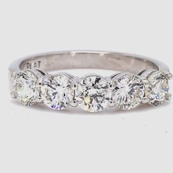 5-stone band in platinum with basket prong set round diamonds.  D1.16ct.t.w.  Size 4.75