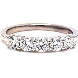 5-stone band in platinum with prong set round diamonds.  D0.83ct.t.w.  Size 5.75