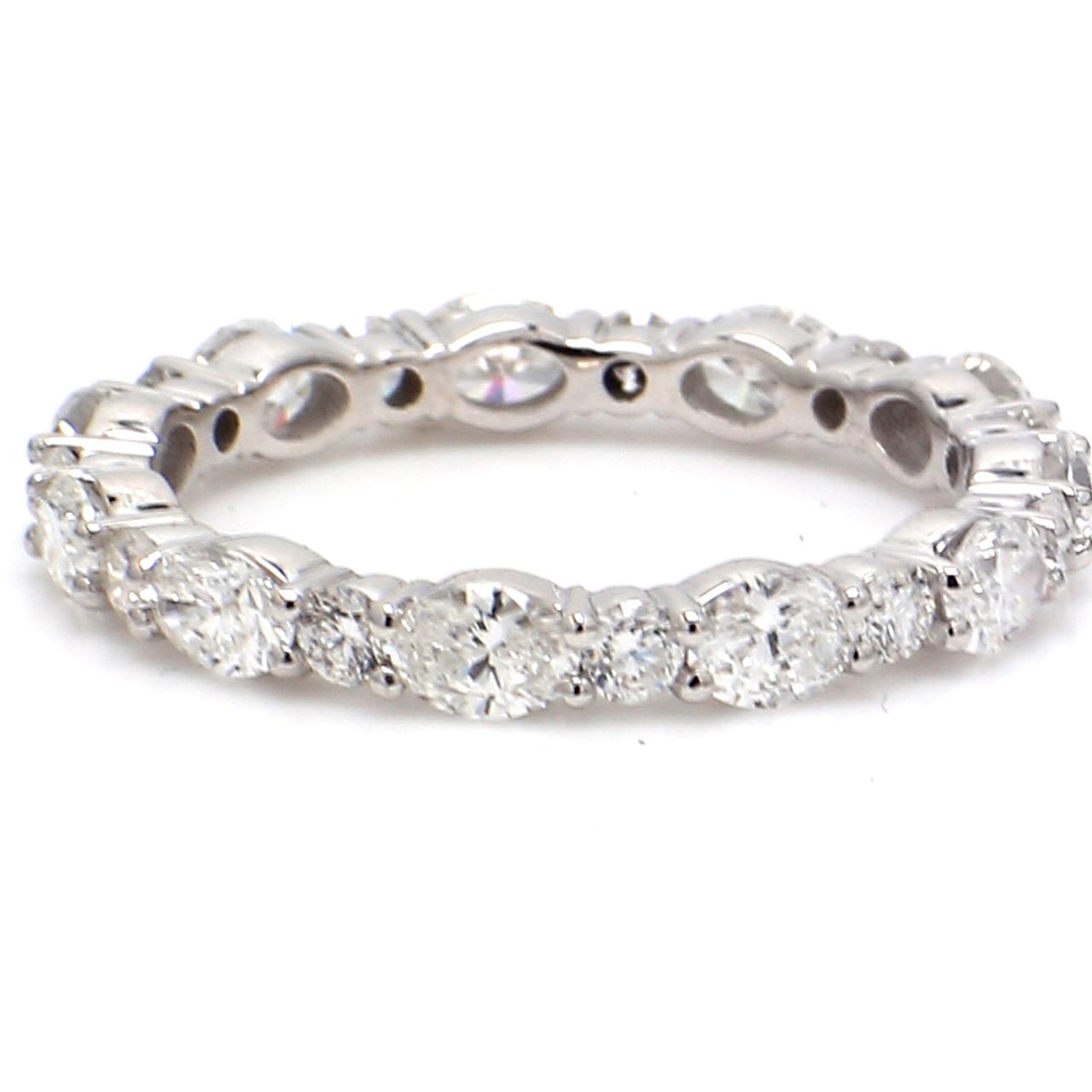 Eternity band in 18K WG with alternating pront set (11) oval cut and 11 round diamonds.  D1.99ct.t.w.  Size 7