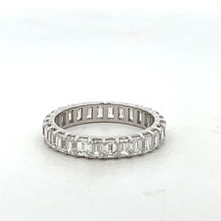 Eternity band in 18K WG with prong set (28) emerald cut diamonds.  D2.46ct.t.w.  Size 5.5