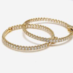 1.5' Inside out hoop earrings in yellow gold shared U-prong set round diamonds.  D2.56ct.t.w.