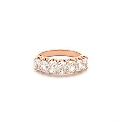 7-stone band in 18K RG with shared U-prong set radiant diamonds.  D1.67ct.t.w.